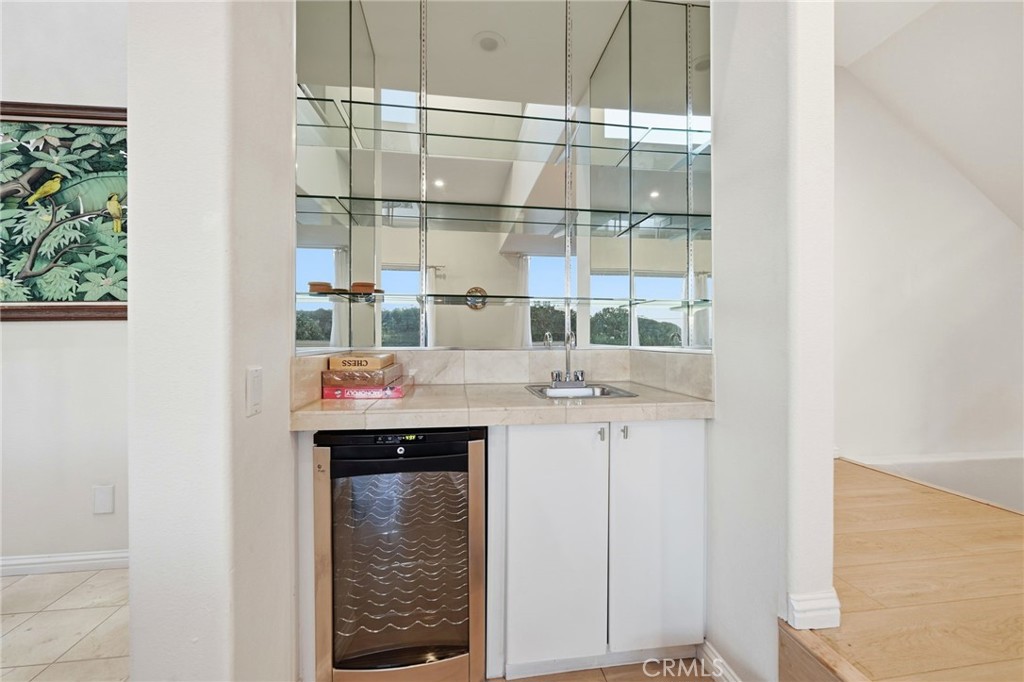 12815 Via Nestore Del Mar, CA 92014 - Photo 17 of 42 a bathroom with a sink and a mirror