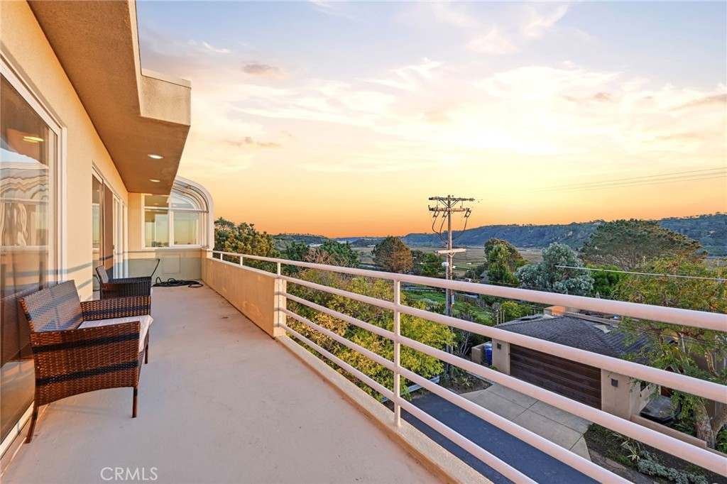 12815 Via Nestore Del Mar, CA 92014 - Photo 37 of 42 a view of a city from a balcony with seating space