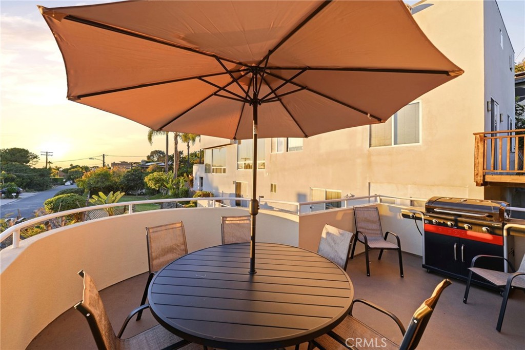 12815 Via Nestore Del Mar, CA 92014 - Photo 38 of 42 an outdoor space with furniture and umbrella