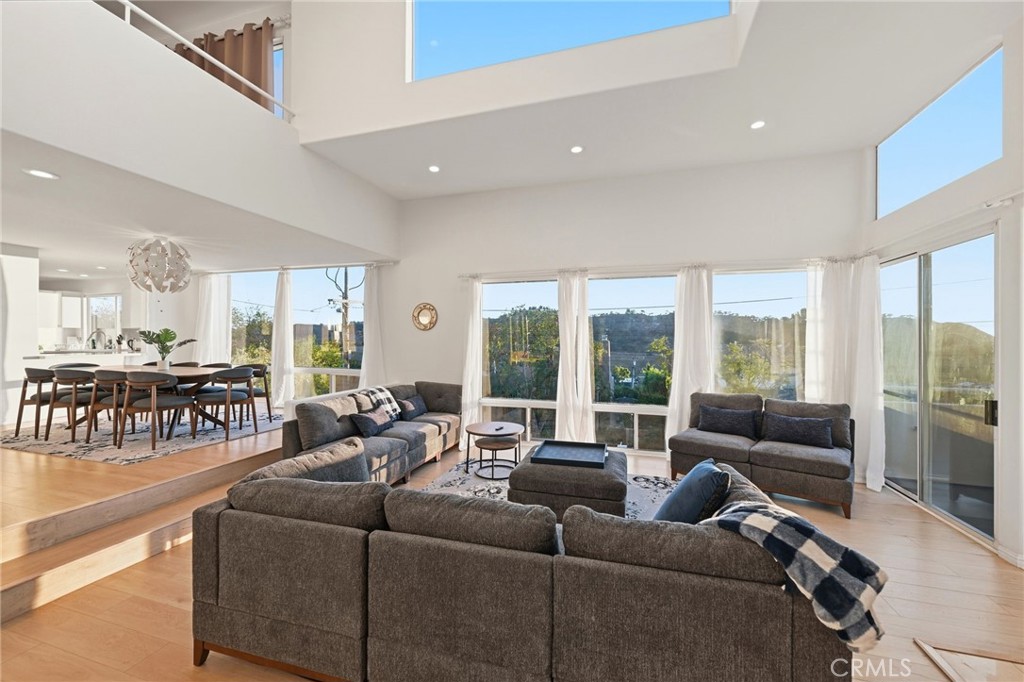 12815 Via Nestore Del Mar, CA 92014 - Photo 4 of 42 a living room with furniture and a large window