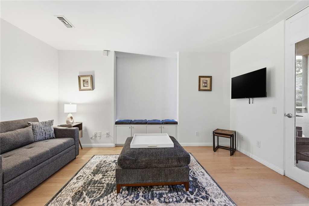 12815 Via Nestore Del Mar, CA 92014 - Photo 6 of 42 a living room with furniture and a flat screen tv