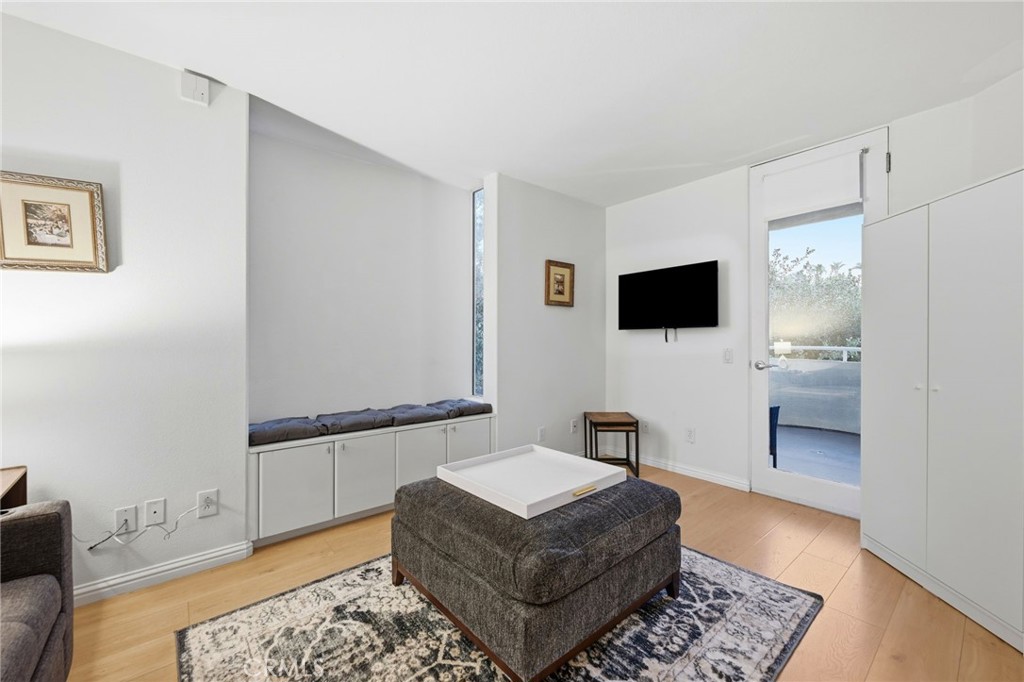 12815 Via Nestore Del Mar, CA 92014 - Photo 7 of 42 a living room with furniture and a flat screen tv