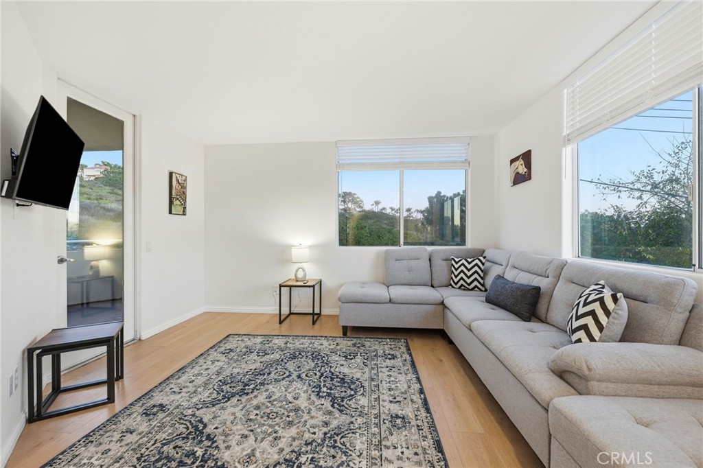 12815 Via Nestore Del Mar, CA 92014 - Photo 9 of 42 a living room with furniture and a flat screen tv