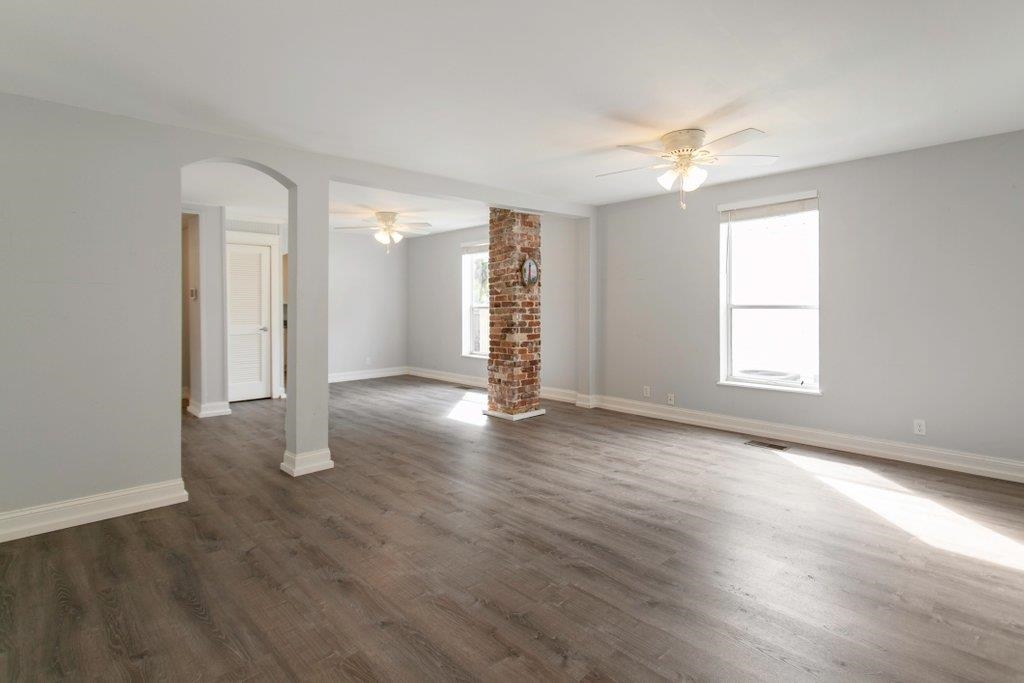 95 Keith Street St. Augustine, FL 32084 - Photo 12 of 49 an empty room with wooden floor and window