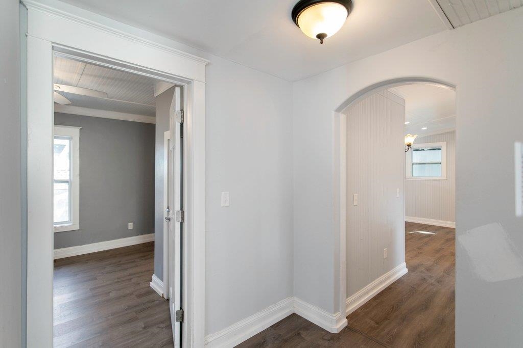 95 Keith Street St. Augustine, FL 32084 - Photo 16 of 49 a view of an empty room with wooden floor and a window