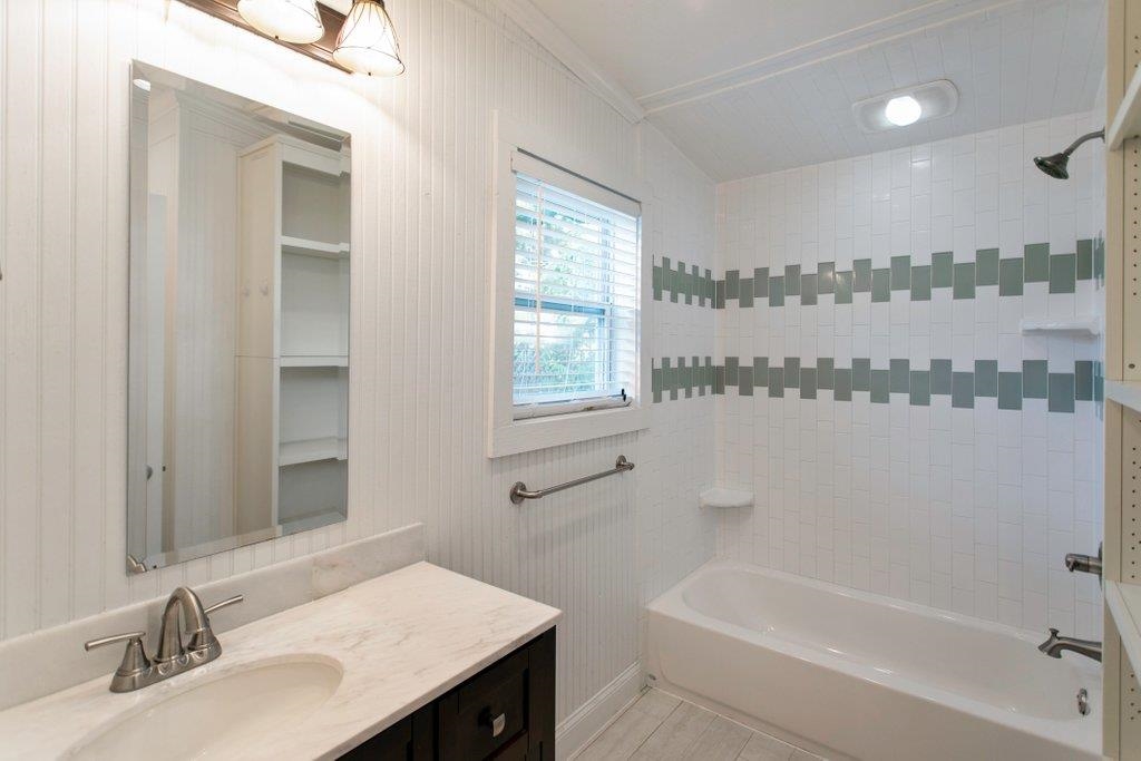 95 Keith Street St. Augustine, FL 32084 - Photo 17 of 49 a bathroom with a sink a toilet and shower