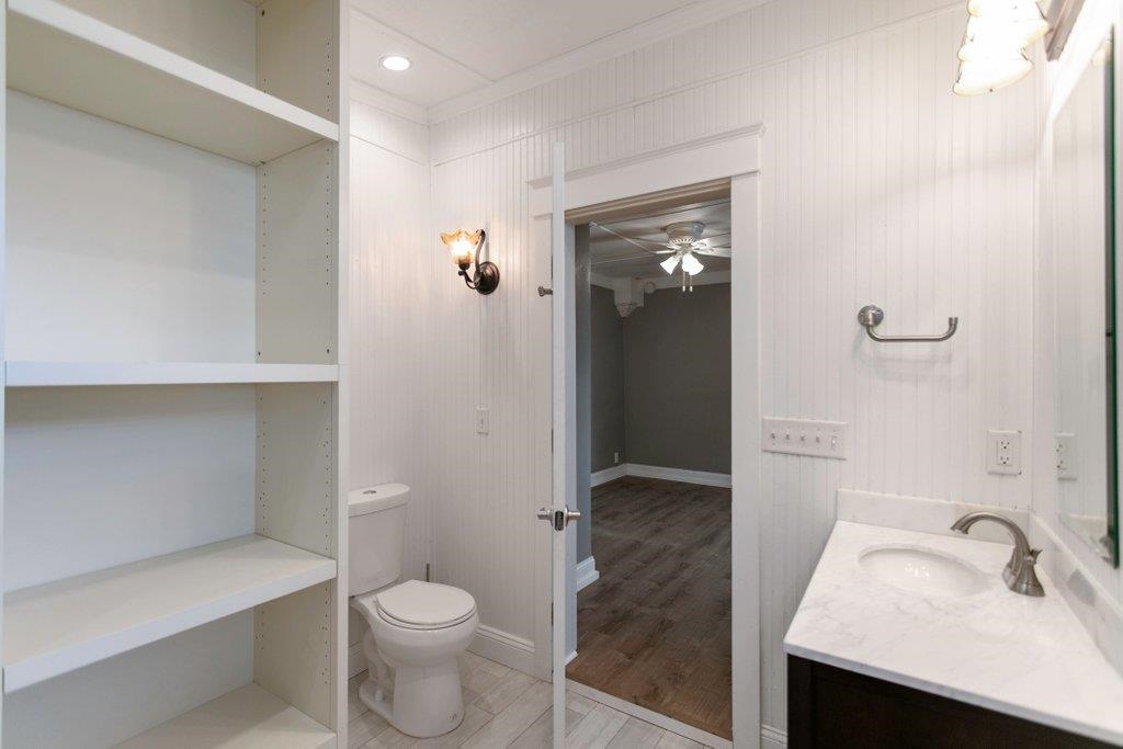 95 Keith Street St. Augustine, FL 32084 - Photo 19 of 49 a bathroom with a sink a toilet and shower