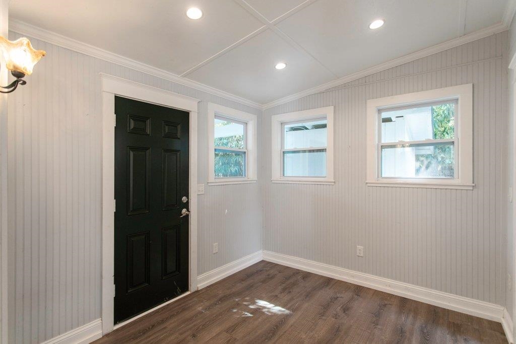 95 Keith Street St. Augustine, FL 32084 - Photo 23 of 49 wooden floor in an empty room with a window