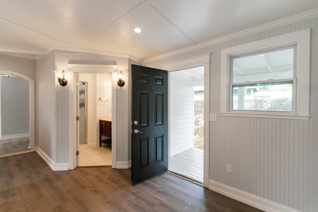 95 Keith Street St. Augustine, FL 32084 - Photo 27 of 49 an empty room with wooden floor and a window