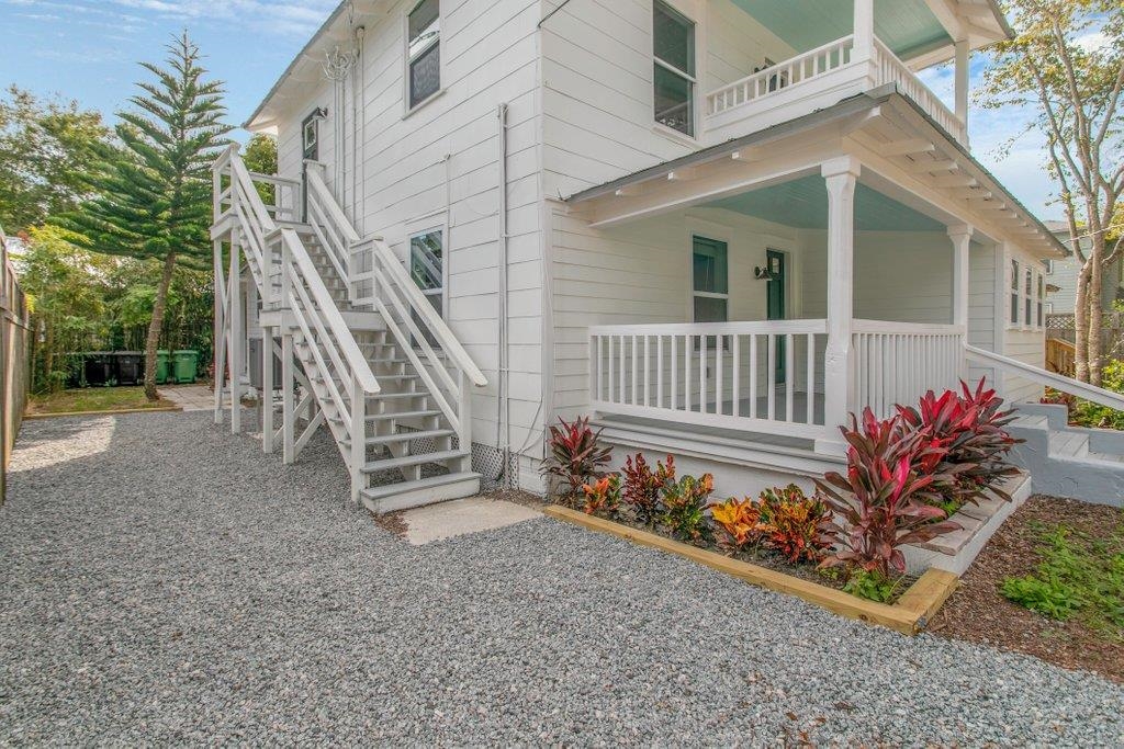 95 Keith Street St. Augustine, FL 32084 - Photo 4 of 49 front view of a house with a bench