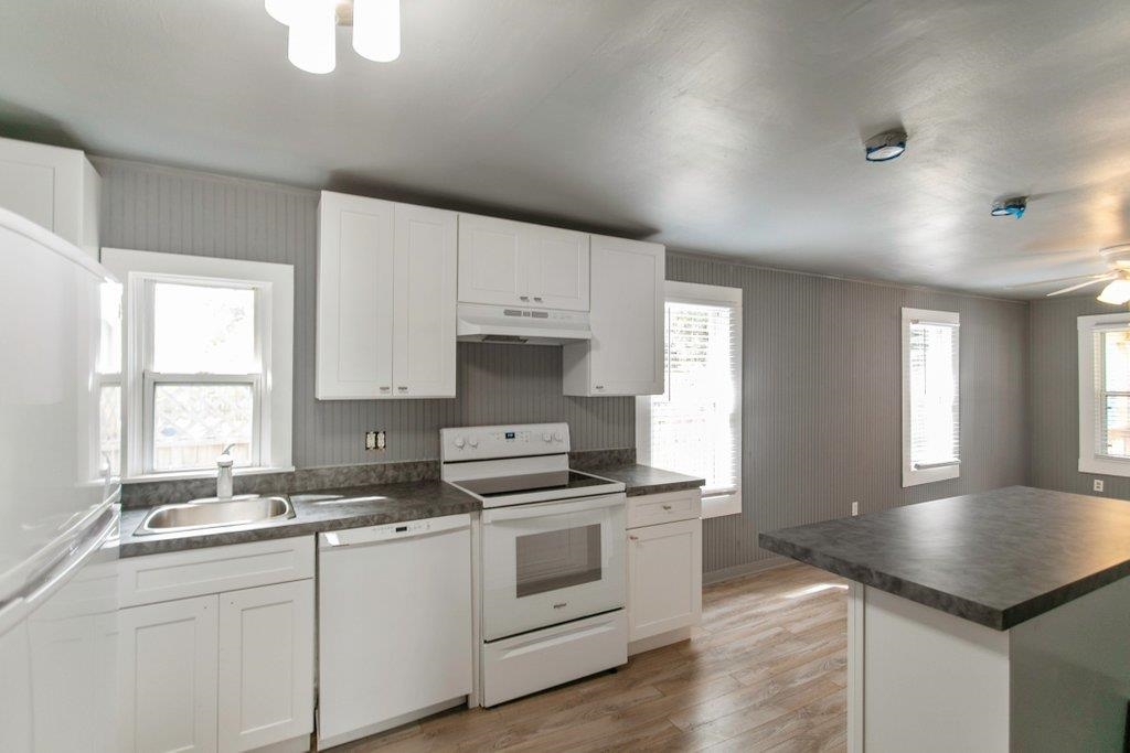 95 Keith Street St. Augustine, FL 32084 - Photo 41 of 49 a kitchen with a stove a sink and a window