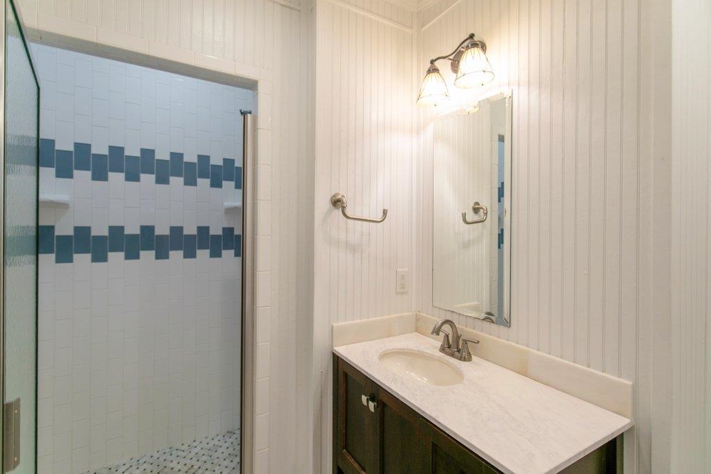 95 Keith Street St. Augustine, FL 32084 - Photo 8 of 49 a bathroom with a sink and a mirror