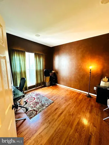a view of a living room and dining room