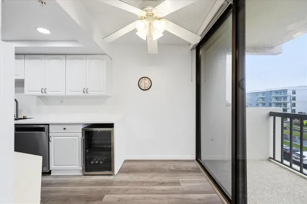 a bathroom with a glass shower door and a sink