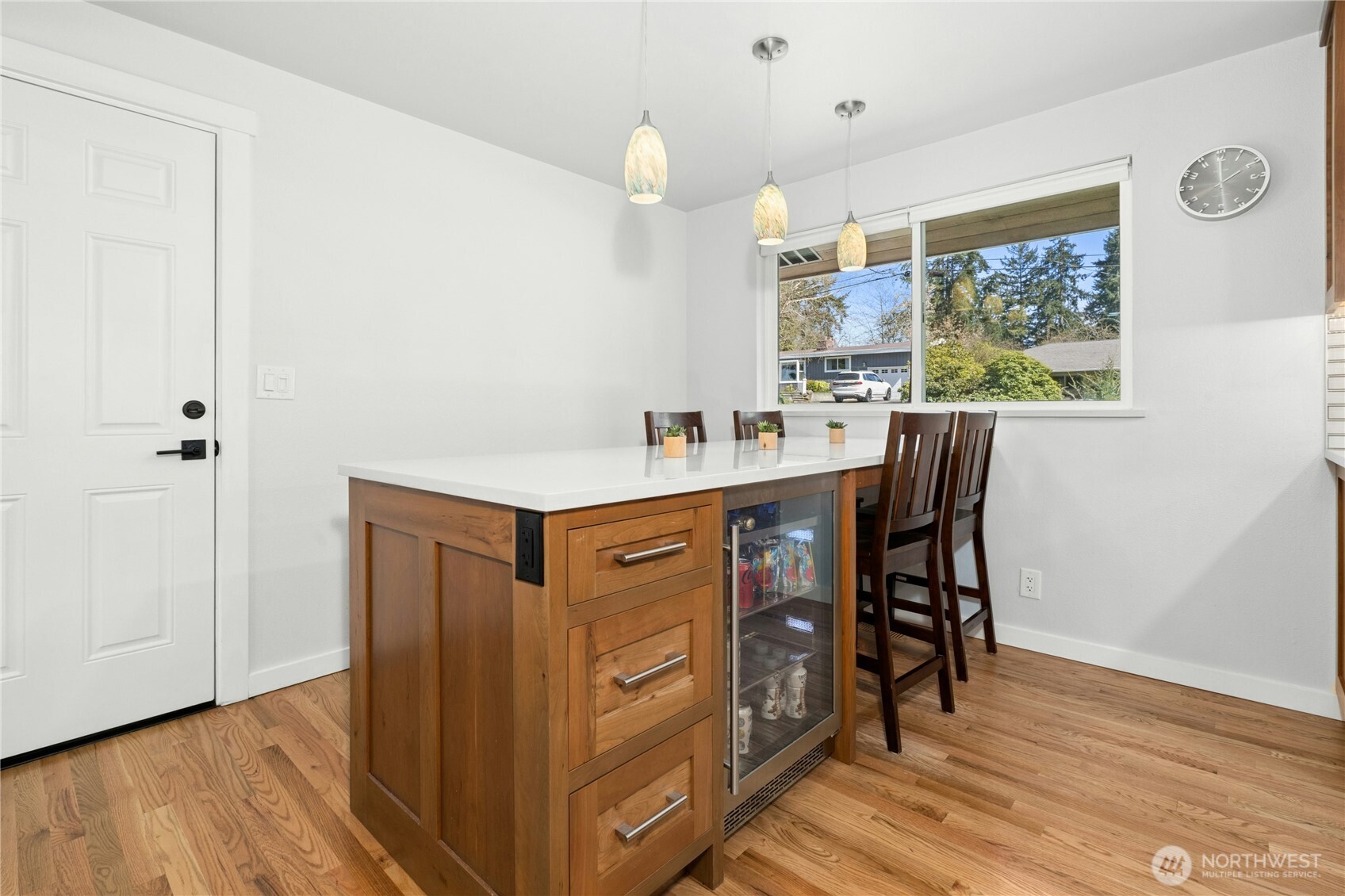 24022 4th Place West Bothell, WA 98021 - Photo 12 of 36 a dining room with a wooden table and chairs