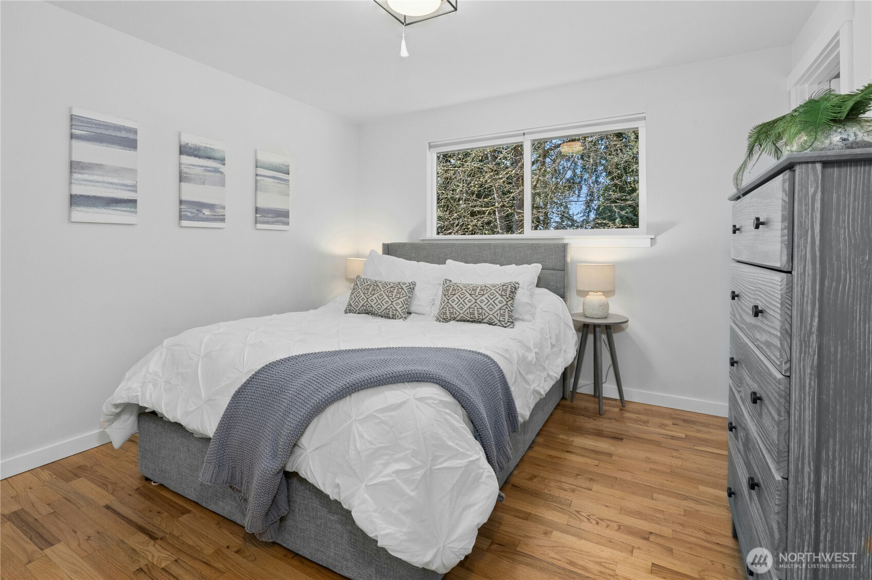 24022 4th Place West Bothell, WA 98021 - Photo 17 of 36 a bedroom with a bed and a window