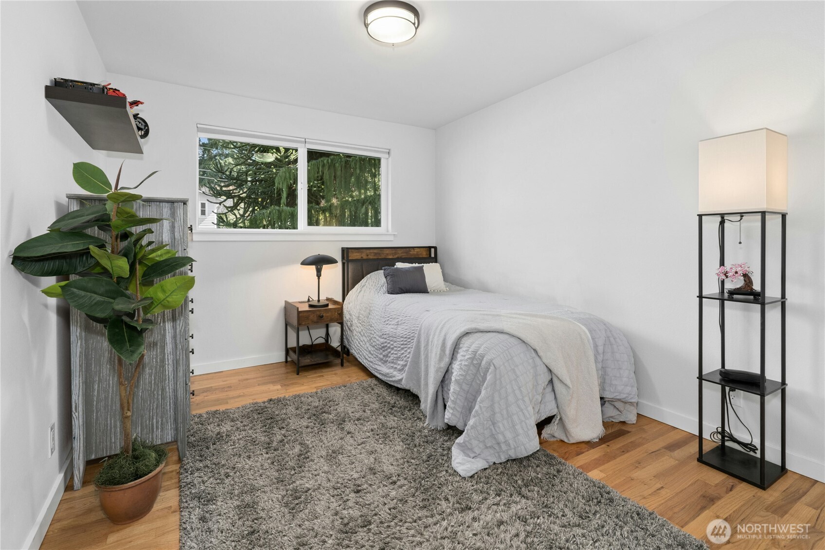 24022 4th Place West Bothell, WA 98021 - Photo 18 of 36 a bedroom with a bed and a window