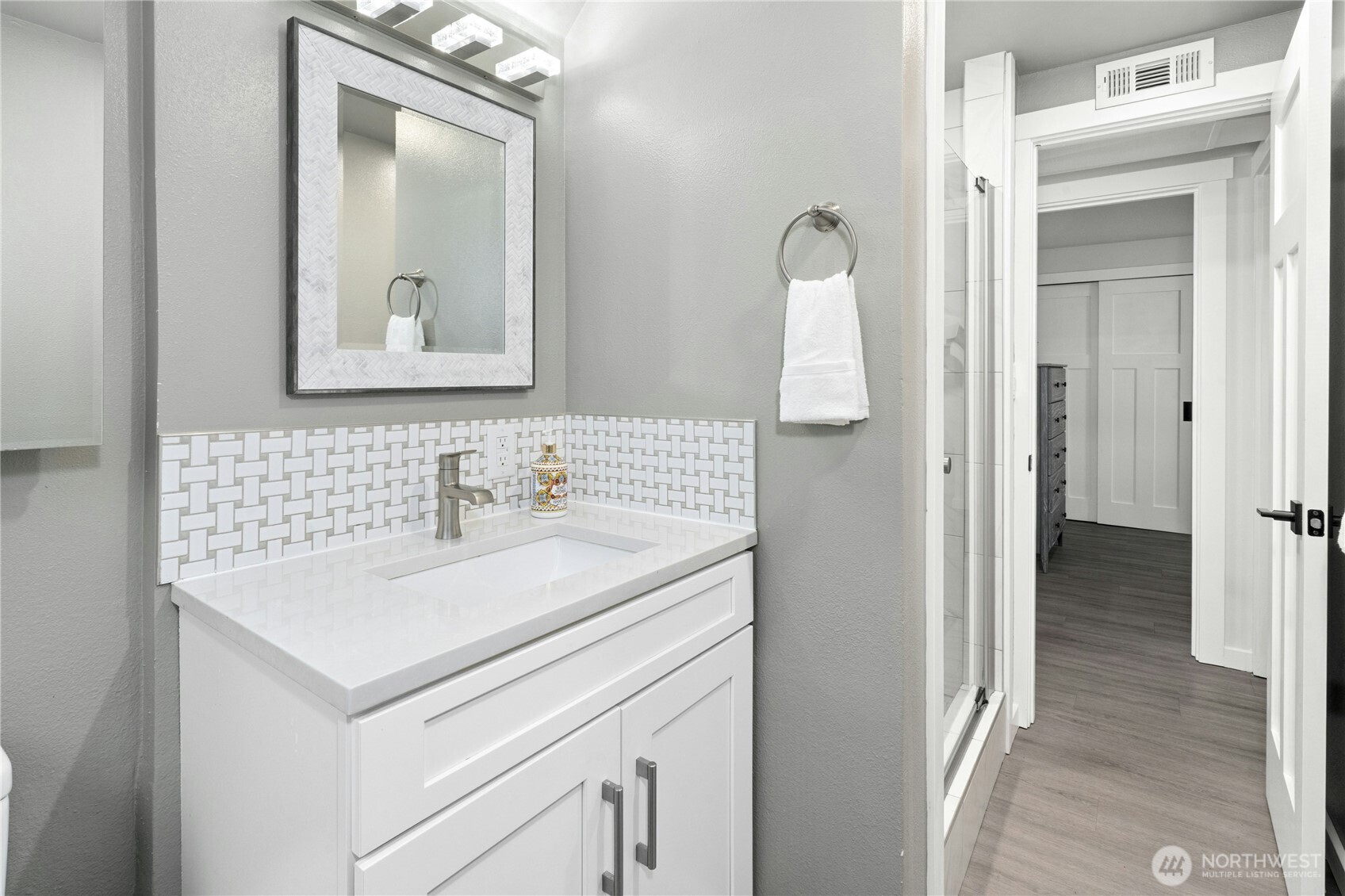 24022 4th Place West Bothell, WA 98021 - Photo 22 of 36 a bathroom with a sink vanity and a mirror