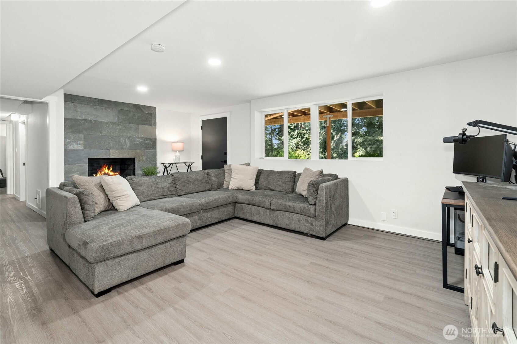24022 4th Place West Bothell, WA 98021 - Photo 26 of 36 a living room with furniture and a flat screen tv