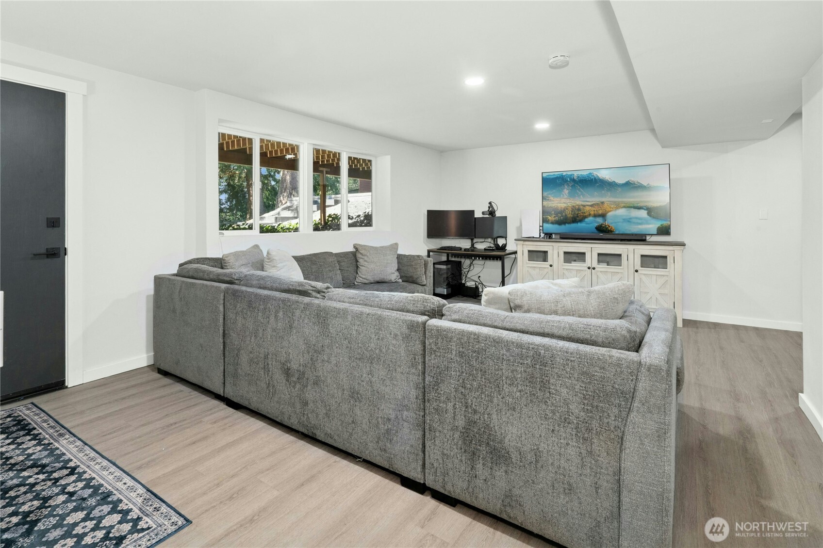 24022 4th Place West Bothell, WA 98021 - Photo 27 of 36 a living room with furniture and a flat screen tv