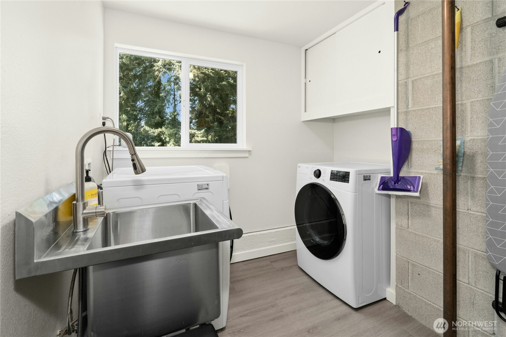 24022 4th Place West Bothell, WA 98021 - Photo 29 of 36 a utility room with sink dryer and washer