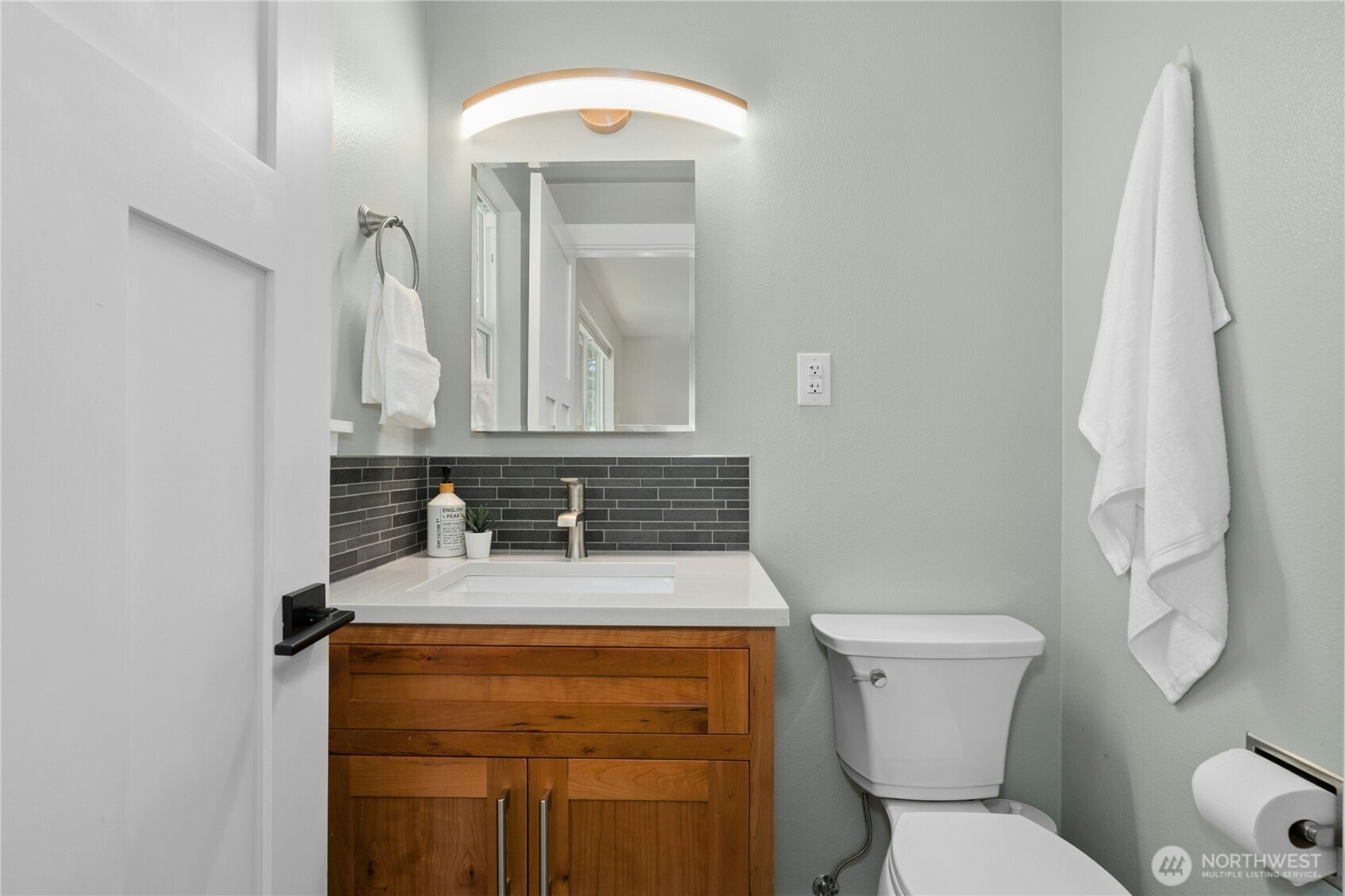 24022 4th Place West Bothell, WA 98021 - Photo 35 of 36 a bathroom with a sink toilet and mirror