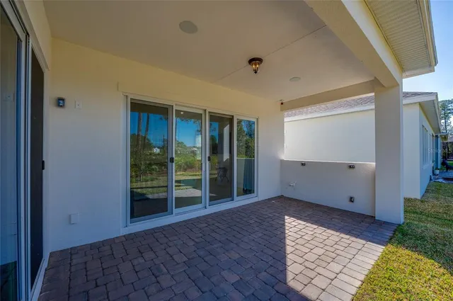 a house view with a backyard space