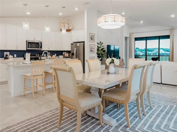 a view of a dining room with furniture