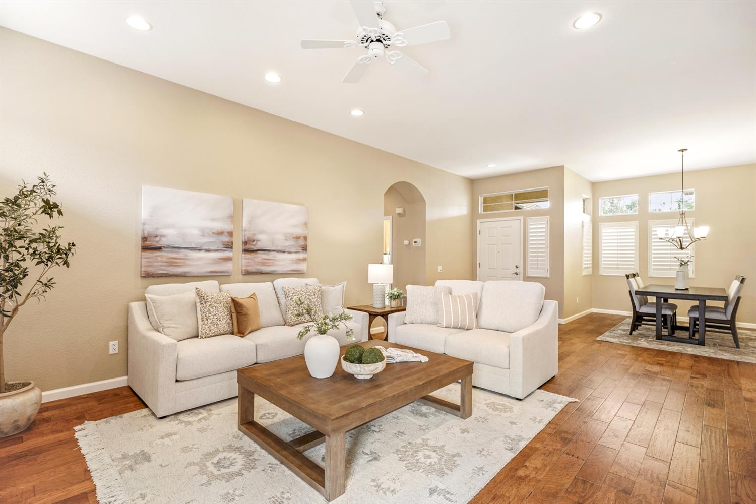 4081 Rose Creek Road Roseville, CA 95747 - Photo 4 of 52 a living room with furniture and wooden floor