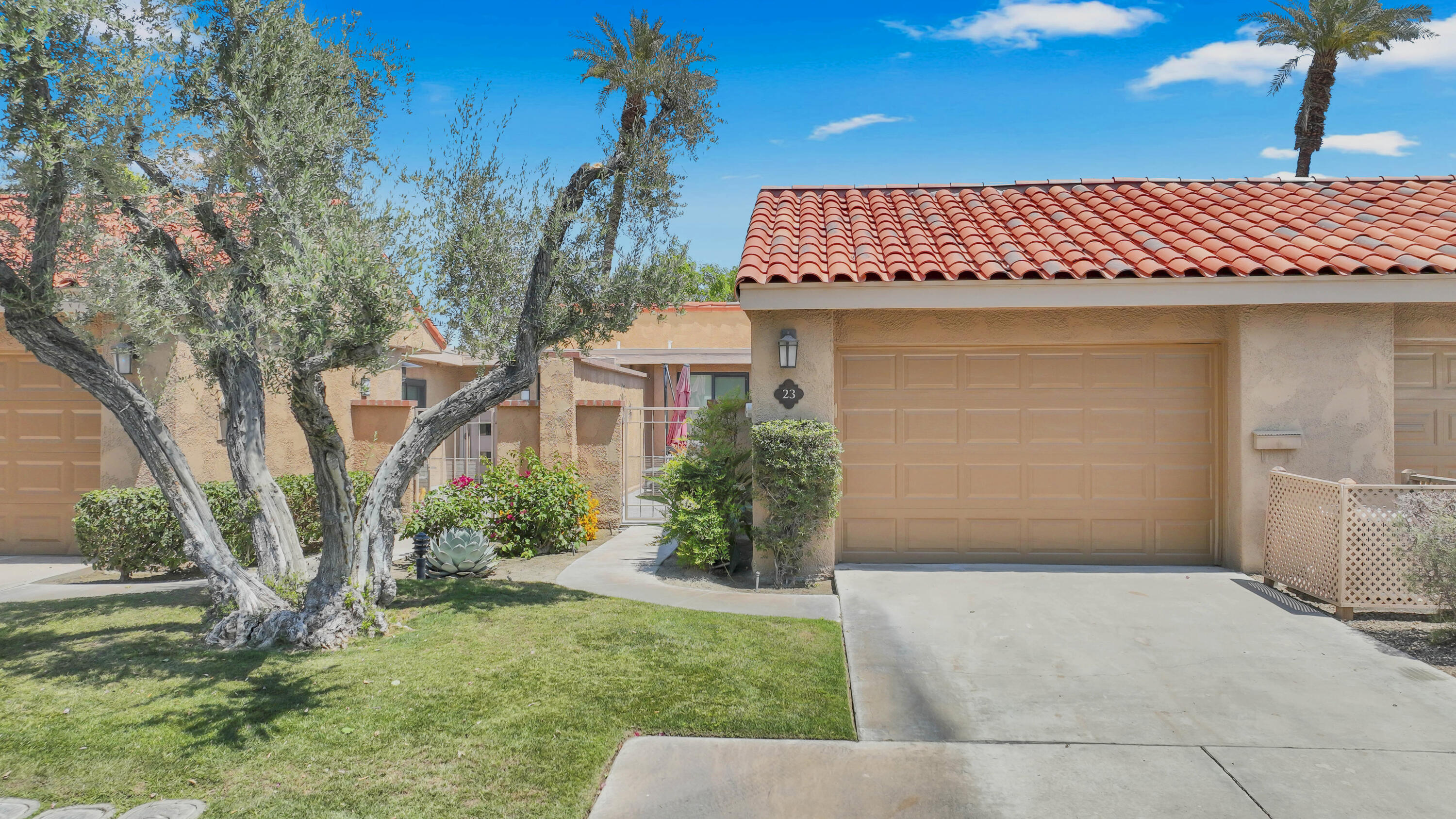 23 Haig Drive Rancho Mirage, CA 92270 - Photo 16 of 49 a view of a house with a yard
