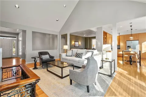 a living room with furniture and a table