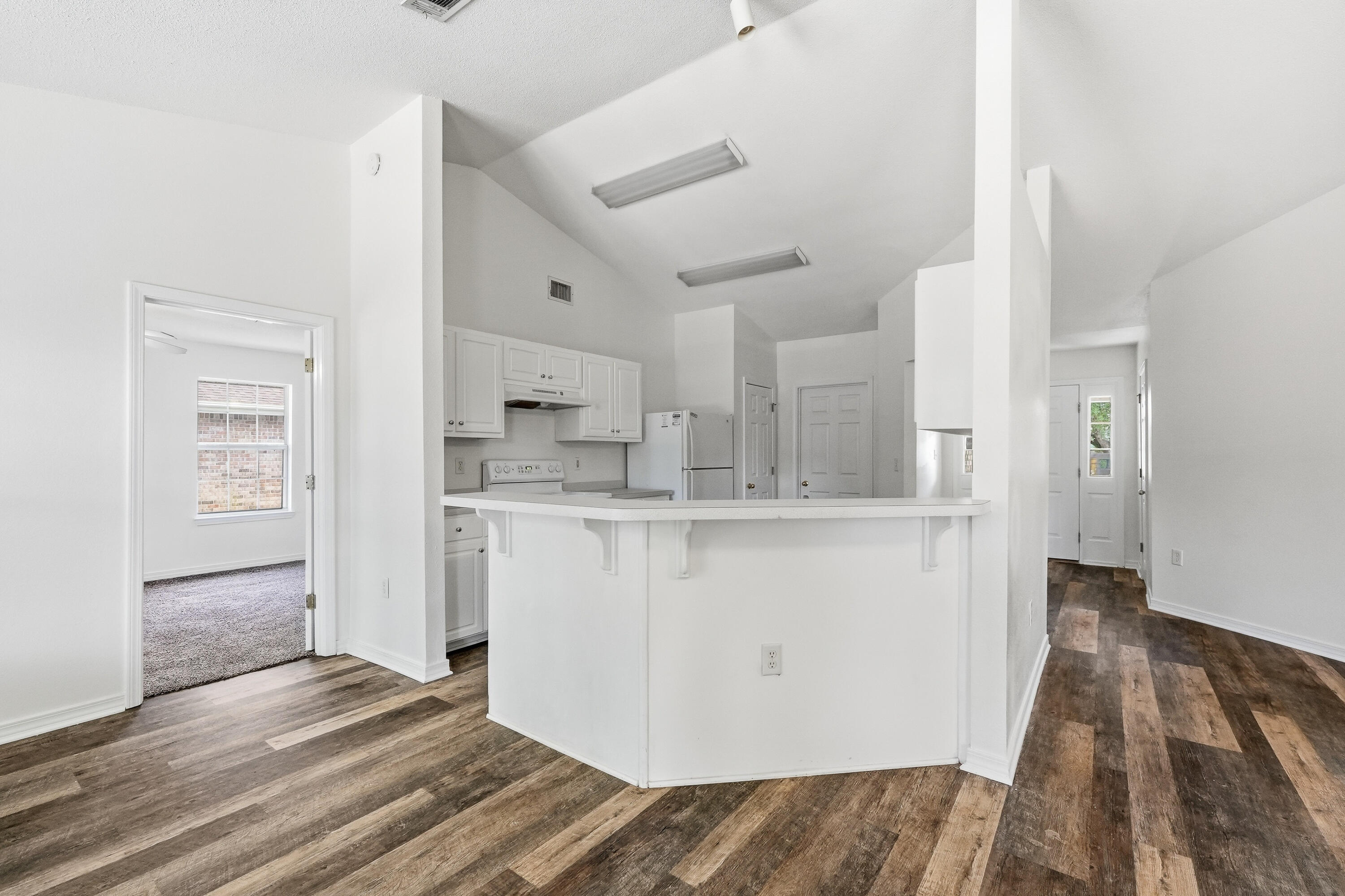 4087 Audiss Road Milton, FL 32583 - Photo 14 of 34 a view of kitchen with wooden floor