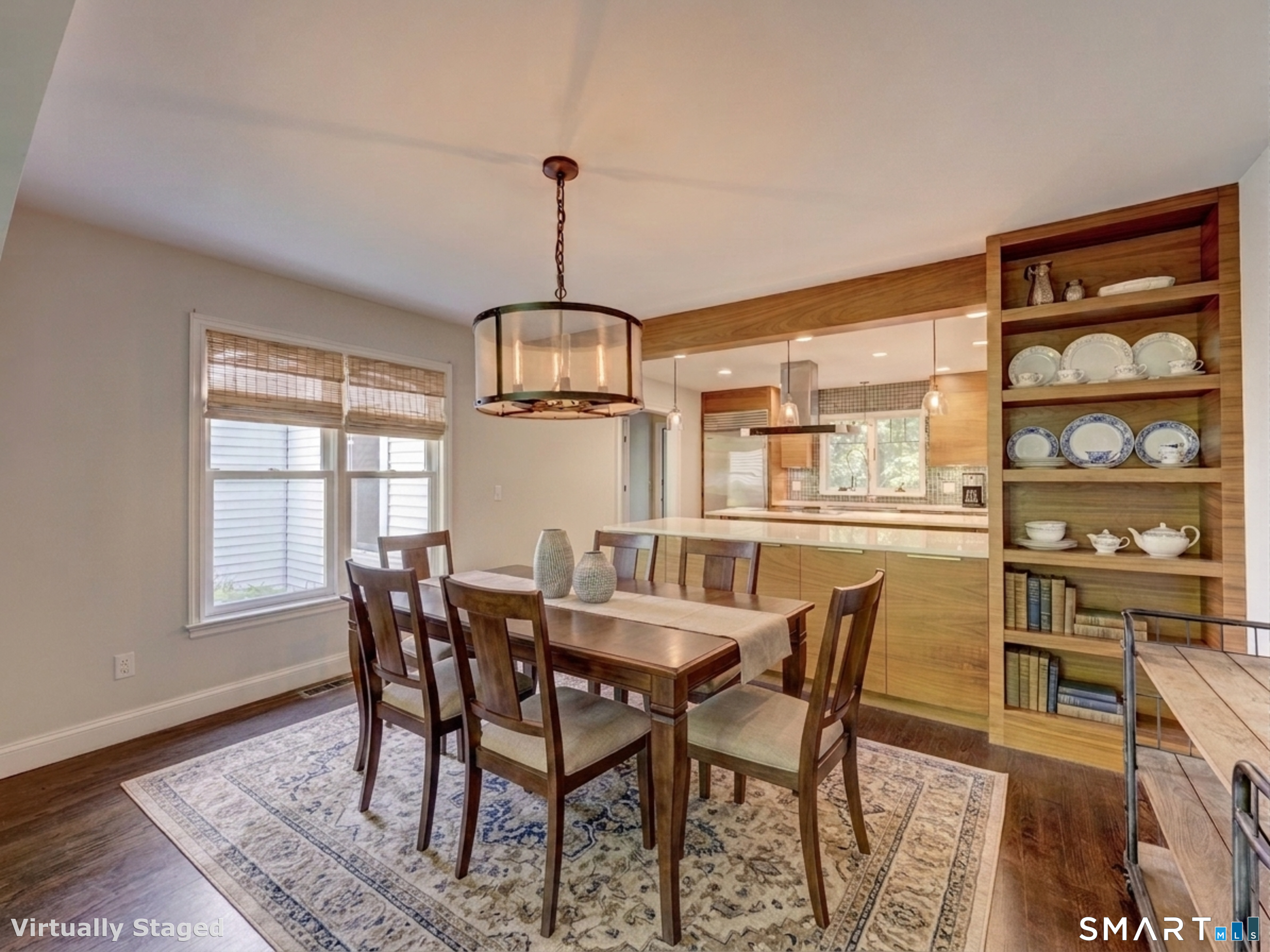 198 Summer Hill Road Madison, CT 06443 - Photo 4 of 22 The dining room opens to the kitchen, it is virtually staged with the furniture