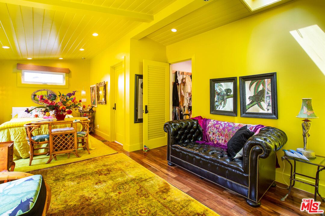 232 Paradise Cove Road Malibu, CA 90265 - Photo 12 of 38 a living room with furniture and a flat screen tv