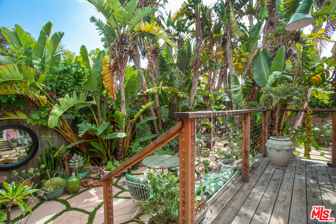 232 Paradise Cove Road Malibu, CA 90265 - Photo 23 of 38 a view of a balcony with wooden floor
