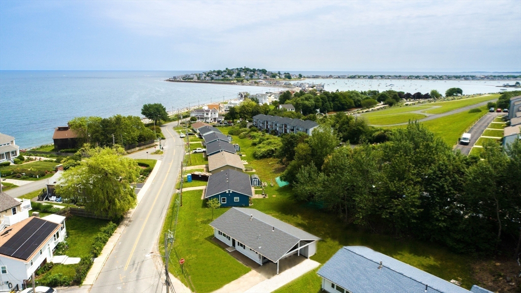 1165 Nantasket Avenue Hull, MA 02045 - Photo 3 of 39 an aerial view of a house with a garden and lake view