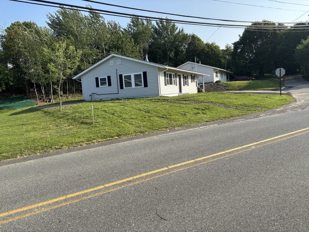1165 Nantasket Avenue Hull, MA 02045 - Photo 6 of 39 a view of spacious house with garden and tall trees