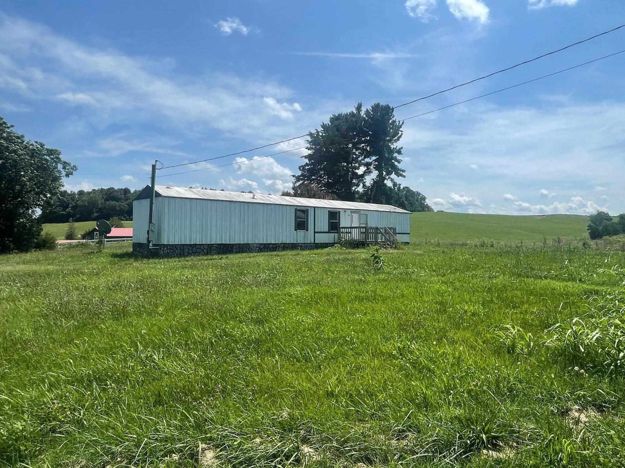 4905 Shackleford Road Mosheim, TN 37818 - Photo 3 of 22 Front