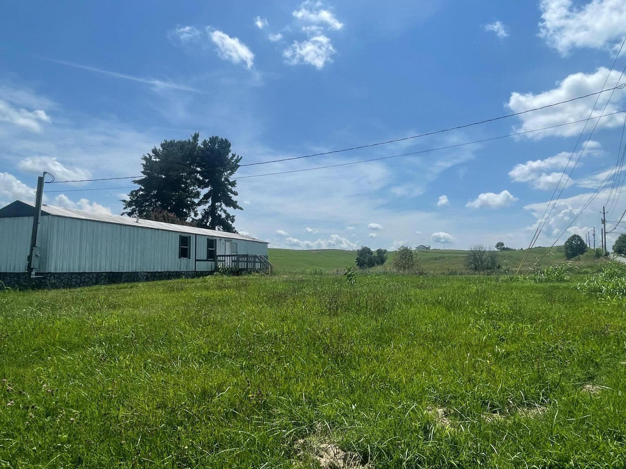 4905 Shackleford Road Mosheim, TN 37818 - Photo 4 of 22 Front