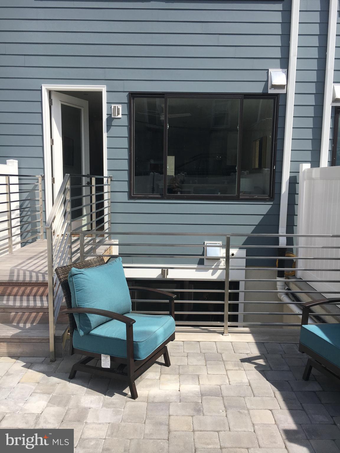 1008 South 17th Street, Unit A Philadelphia, PA 19146 - Photo 6 of 13 a small garden in the corners of a house