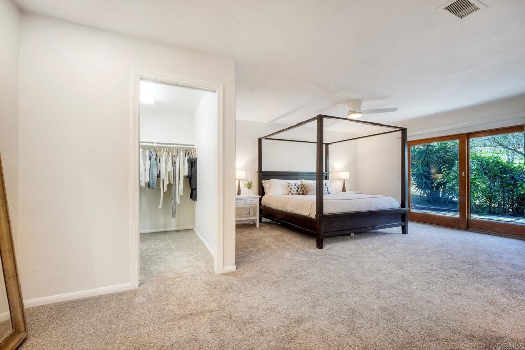 2830 Green Canyon Road Fallbrook, CA 92028 - Photo 20 of 43 Walk-in closet & slider leading to another patio.