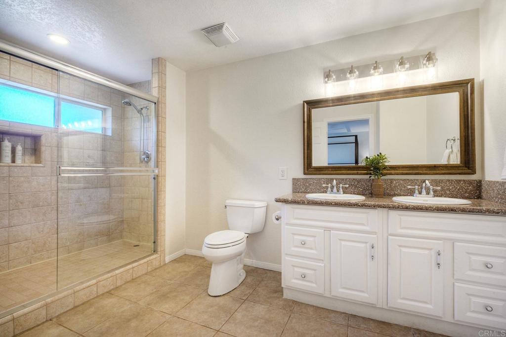 2830 Green Canyon Road Fallbrook, CA 92028 - Photo 22 of 43 Primary ensuite. Dual sinks, walk-in shower