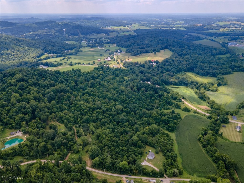 0 Mill St Road Quaker City, OH 43773 - Photo 20 of 23 Aerial overview of property's location featuring a forest