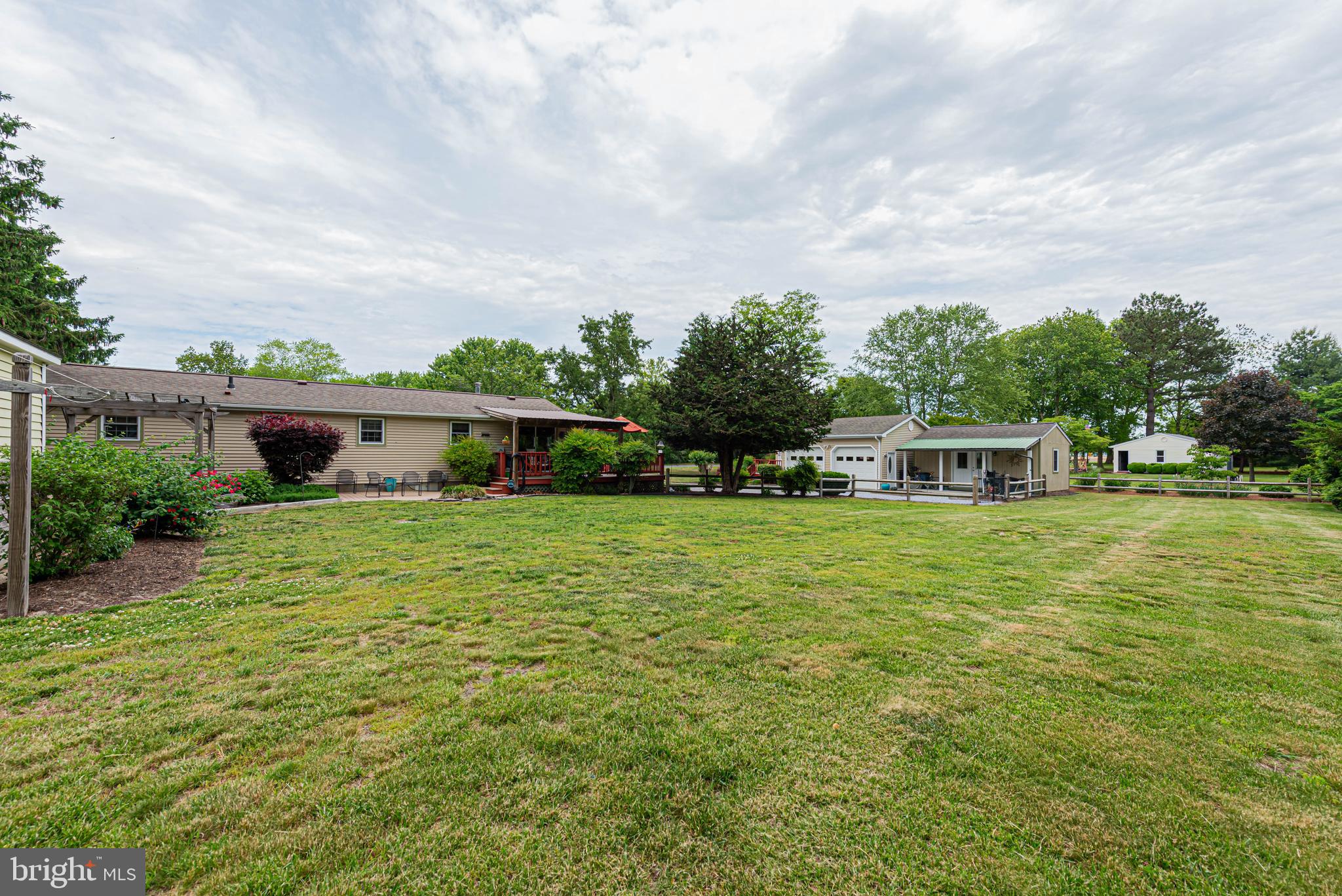 31468 Wingate Road Dagsboro, DE 19939 - Photo 45 of 48 a front view of a house with a garden