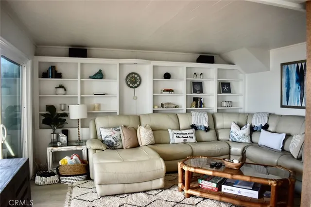 a living room with furniture cabinets and a couch