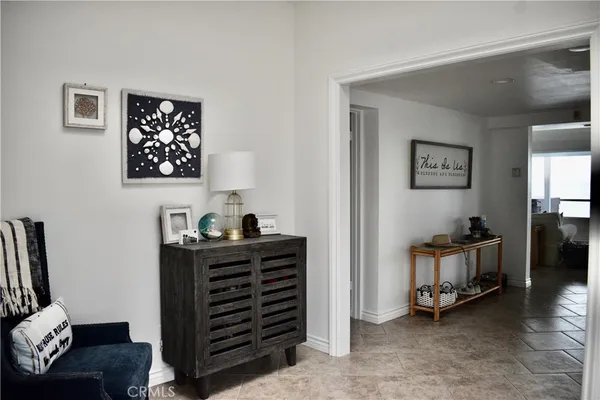 a view of a workspace with furniture and toys