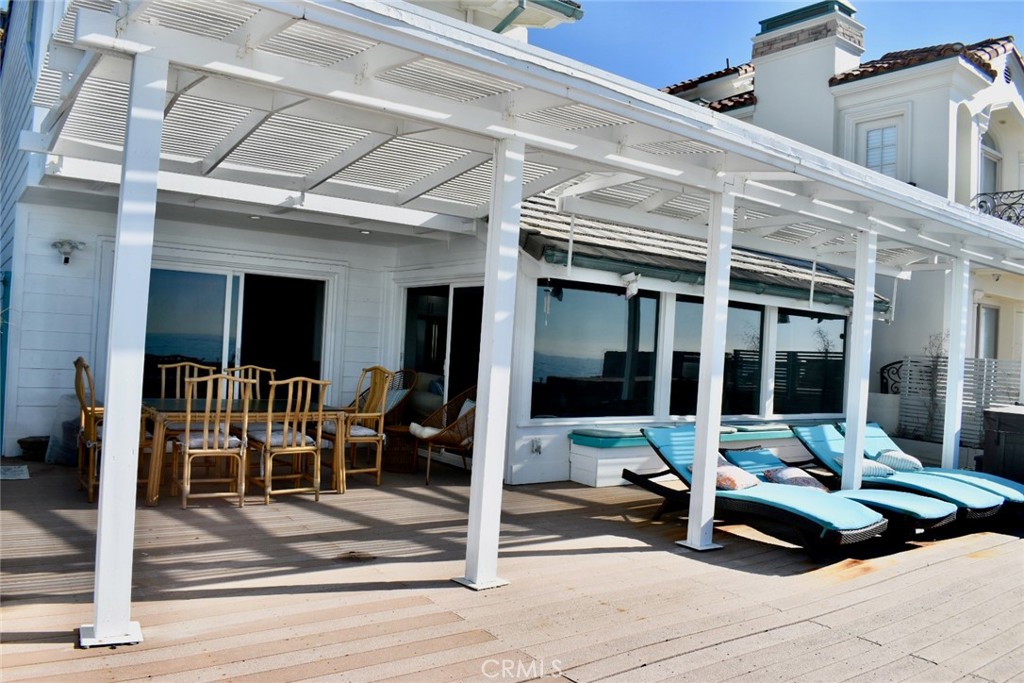 35605 Beach Road Dana Point, CA 92624 - Photo 34 of 55 a building outdoor space with patio furniture and garden view