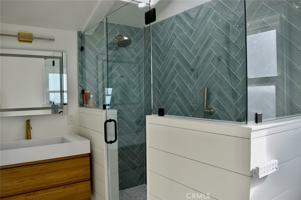 35605 Beach Road Dana Point, CA 92624 - Photo 41 of 55 a bathroom with a shower and a sink