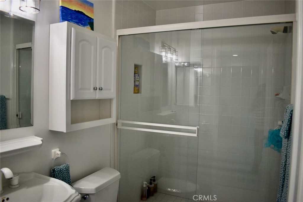 35605 Beach Road Dana Point, CA 92624 - Photo 46 of 55 a bathroom with a shower and a toilet