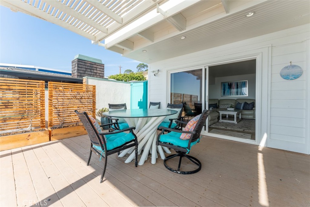35605 Beach Road Dana Point, CA 92624 - Photo 50 of 55 a view of a dining room with furniture window and outside view